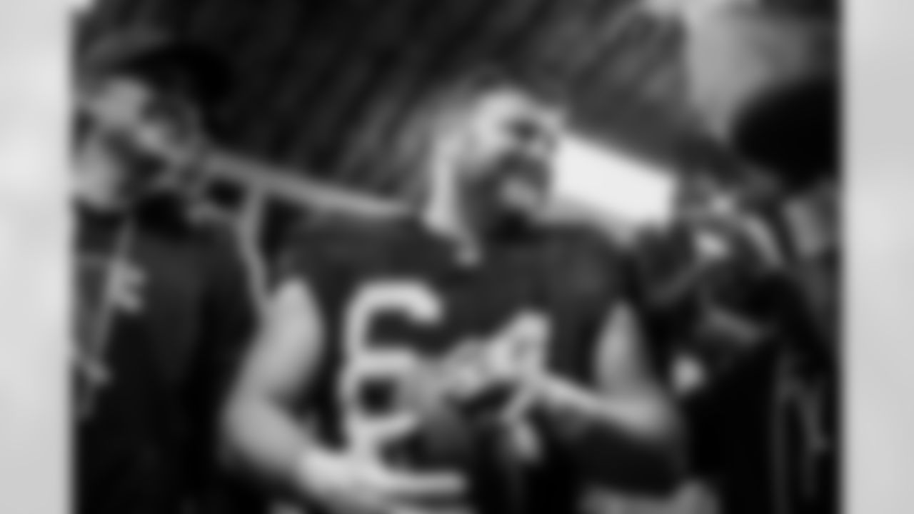 Atlanta Falcons offensive lineman Ryan Neuzil #64 celebrates in the locker room during the Week 15 Game against the Tampa Bay Buccaneers at Raymond James Stadium in Tampa, Florida on Thursday, December 11, 2025. (Photo by Jay Bendlin/Atlanta Falcons)