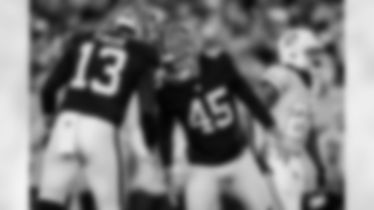 Atlanta Falcons punter Bradley Pinion #13 and Atlanta Falcons kicker Zane Gonzalez #45 during the Week 15 Game against the Tampa Bay Buccaneers at Raymond James Stadium in Tampa, Florida on Thursday, December 11, 2025. (Photo by Taylor McLaughlin/Atlanta Falcons)