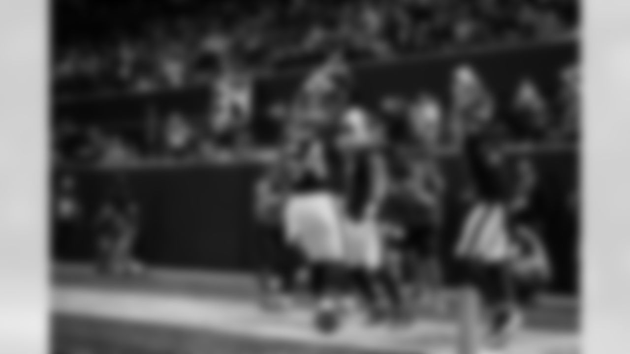 Atlanta Falcons running back Bijan Robinson #7 celebrates with Atlanta Falcons offensive lineman Ryan Neuzil #64  after scoring a touchdown during the Week 17 Game against the Los Angeles Rams at Mercedes-Benz Stadium in Atlanta, Georgia on Monday, December 29, 2025. (Photo by Steven Burroughs/Atlanta Falcons)