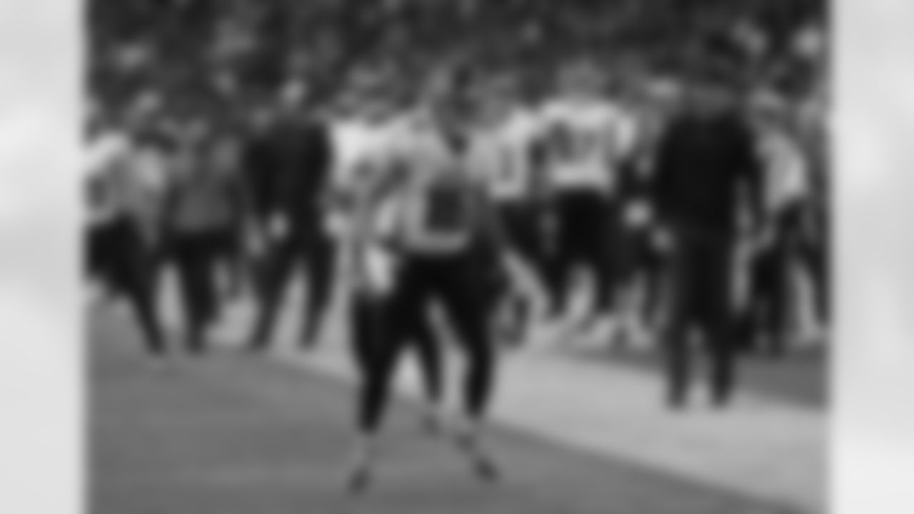 Atlanta Falcons wide receiver Scotty Miller #16 celebrates with teammates after catching a touchdown pass during the second quarter of the Week 10 Game against the Arizona Cardinals at State Farm Stadium in Glendale, Arizona on Sunday, November 12, 2023. (Photo by Shanna Lockwood/Atlanta Falcons)