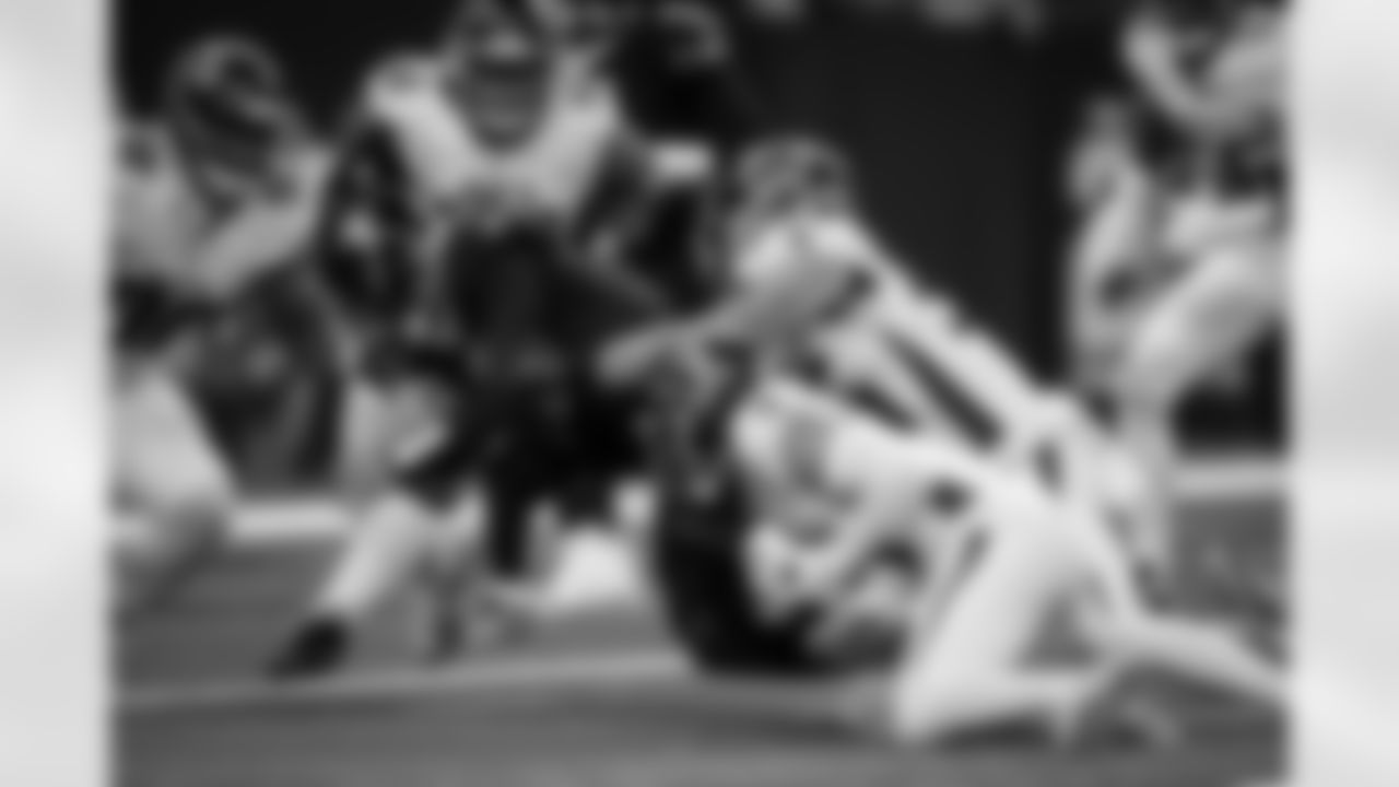 Atlanta Falcons inside linebacker Kaden Elliss #55 , Atlanta Falcons safety Jessie Bates III #3 and Atlanta Falcons defensive lineman Ruke Orhorhoro #98  make a tackle during the Week 12 Game against the New Orleans Saints at Caesars Superdome in New Orleans, Louisiana on Sunday, November 23, 2025. (Photo by Taylor McLaughlin/Atlanta Falcons)