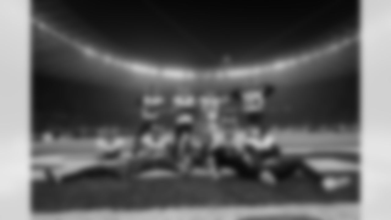 Atlanta Falcons edge rusher Jalon Walker #11 celebrates with teammates after a sack and fumble recovery during the third quarter of the Week 10 Game against the Indianapolis Colts at Olympic Stadium in Berlin, Germany on Sunday, November 9, 2025. (Photo by Taylor McLaughlin/Atlanta Falcons)