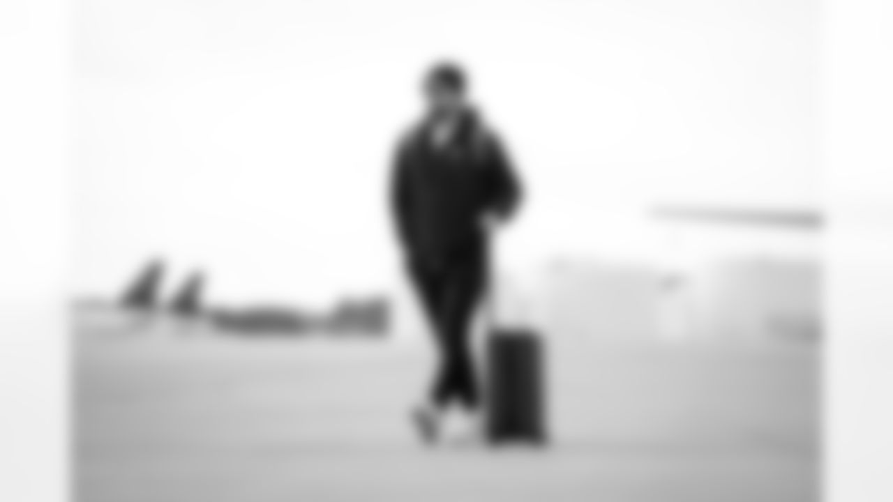 Atlanta Falcons kicker Zane Gonzalez #45 boards the plane at Hartsfield-Jackson International Airport in Atlanta, Ga. on Taylor McLaughlin/Atlanta Falcons)