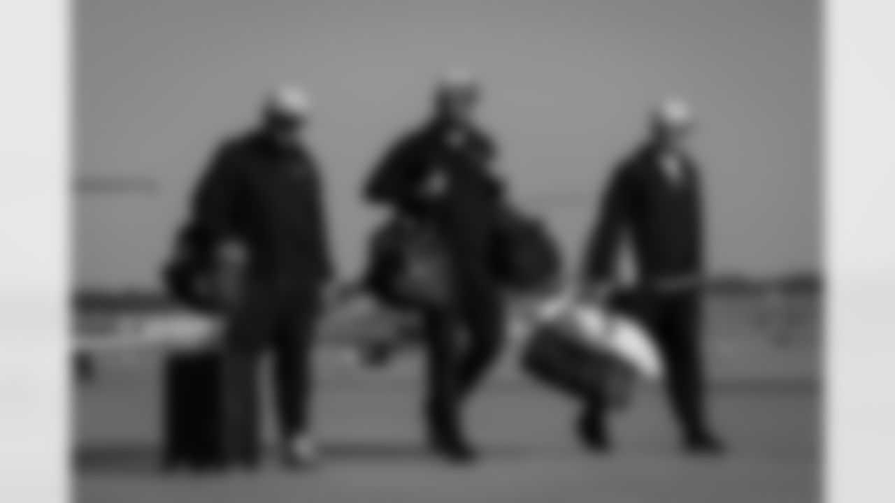 Atlanta Falcons long snapper Liam McCullough #49, Atlanta Falcons punter Bradley Pinion #13, and Atlanta Falcons long snapper Zach Triner #59 board the plane at Hartsfield-Jackson International Airport in Atlanta, Ga. on Saturday, November 6, 2025. (Photo by Taylor McLaughlin/Atlanta Falcons)