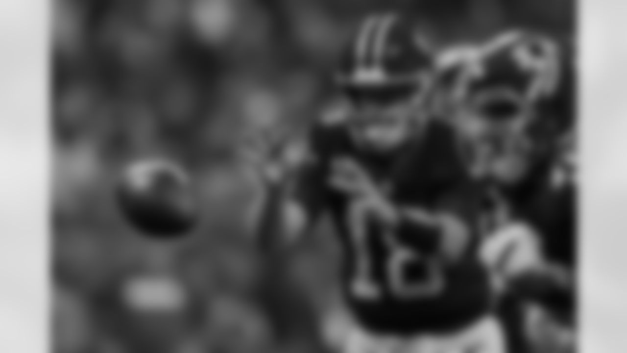 Atlanta Falcons quarterback Kirk Cousins #18 receiving a snap during the Week 5 Game against the Tampa Bay Buccaneers at Mercedes-Benz Stadium in Atlanta, Georgia on Thursday, October 3, 2024. (Photo by Brandon Magnus/Atlanta Falcons)