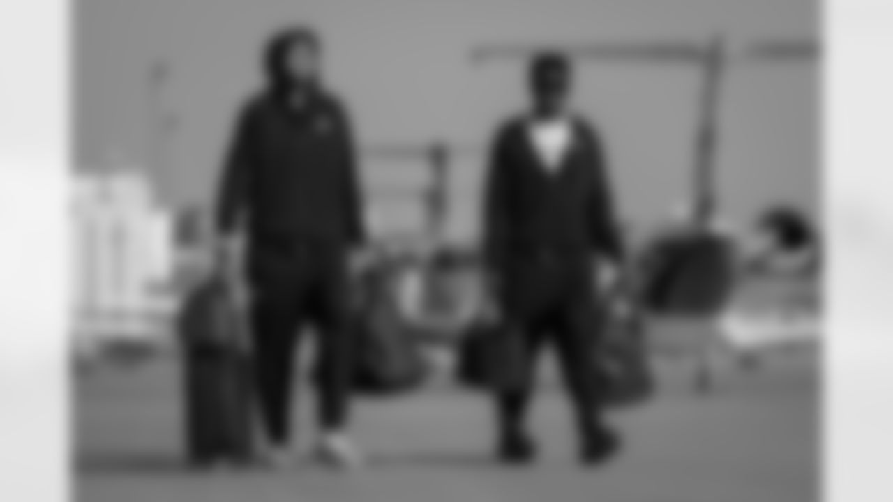 Atlanta Falcons wide receiver Drake London #5 and Atlanta Falcons wide receiver Chris Blair #19 board the plane at Hartsfield-Jackson International Airport in Atlanta, Ga. on Saturday, November 6, 2025. (Photo by Taylor McLaughlin/Atlanta Falcons)