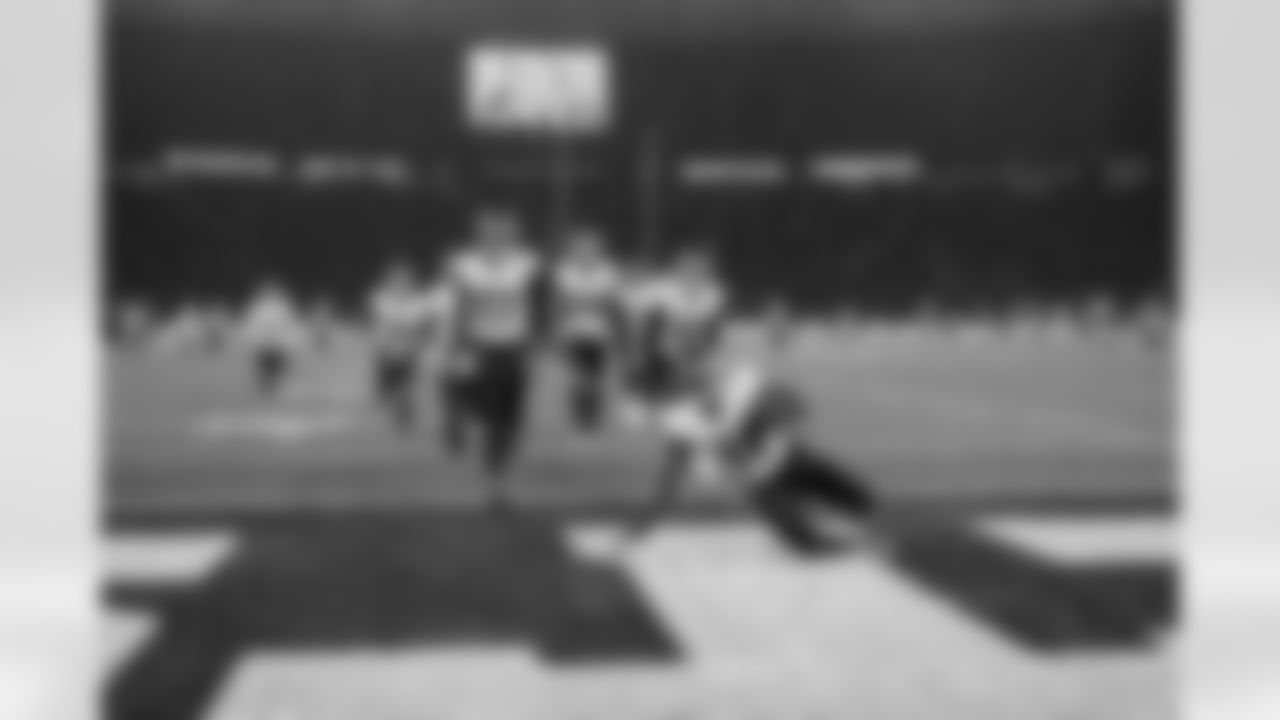 Atlanta Falcons edge rusher Jalon Walker #11 celebrates with teammates after a sack and fumble recovery during the third quarter of the Week 10 Game against the Indianapolis Colts at Olympic Stadium in Berlin, Germany on Sunday, November 9, 2025. (Photo by Taylor McLaughlin/Atlanta Falcons)