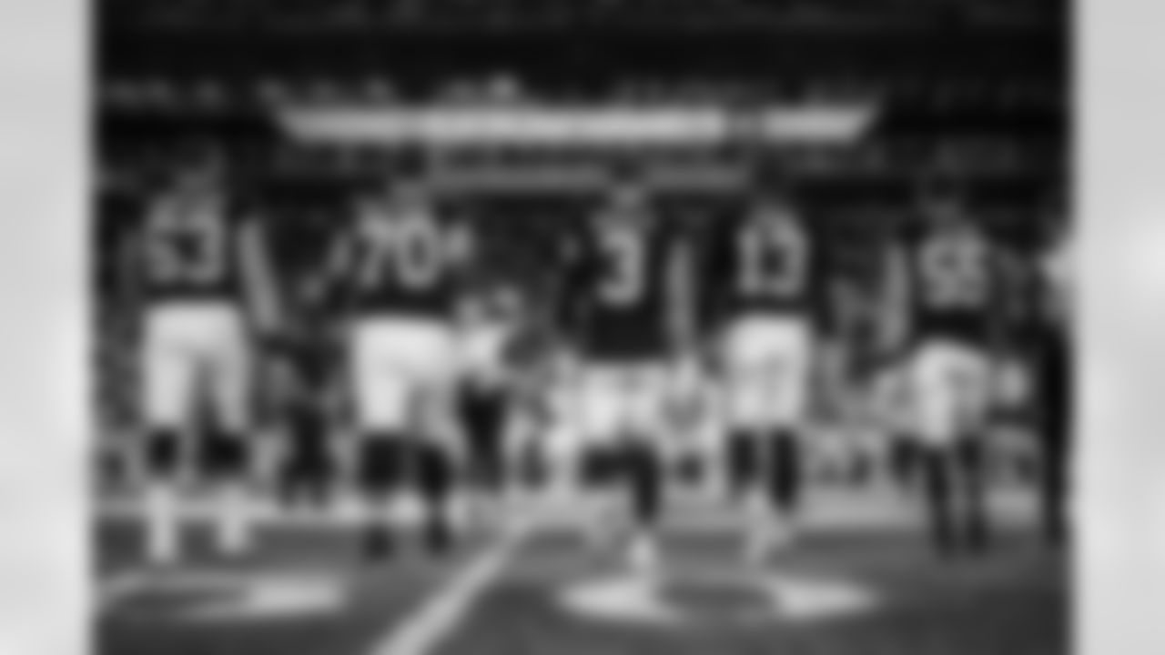 Atlanta Falcons guard Chris Lindstrom #63 , Atlanta Falcons tackle Jake Matthews #70, Atlanta Falcons safety Jessie Bates III #3 , Atlanta Falcons punter Bradley Pinion #13 and Atlanta Falcons inside linebacker Kaden Elliss #55 walk to the center of the field during the Week 15 Game against the Tampa Bay Buccaneers at Raymond James Stadium in Tampa, Florida on Thursday, December 11, 2025. (Photo by Jay Bendlin/Atlanta Falcons)