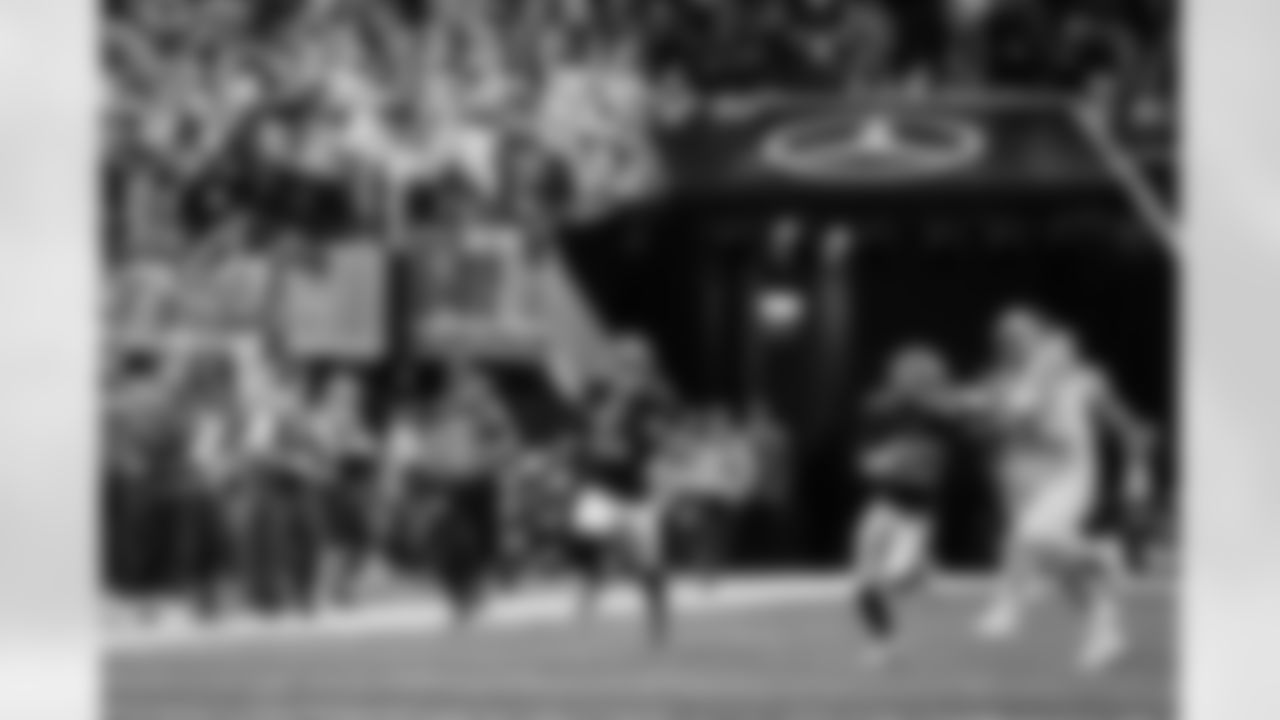 Atlanta Falcons safety Xavier Watts #31 returns the ball after an interception during the Week 17 Game against the Los Angeles Rams at Mercedes-Benz Stadium in Atlanta, Georgia on Monday, December 29, 2025. (Photo by Steven Burroughs/Atlanta Falcons)