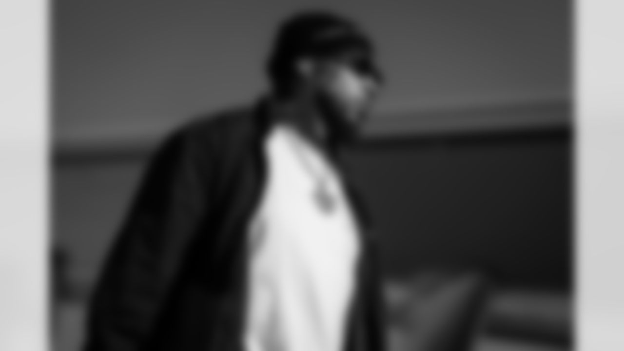 Atlanta Falcons linebacker Josh Woods #42 boards the plane at Hartsfield-Jackson International Airport in Atlanta, Ga. on Saturday, December 20, 2025. (Photo by Jay Bendlin/Atlanta Falcons)