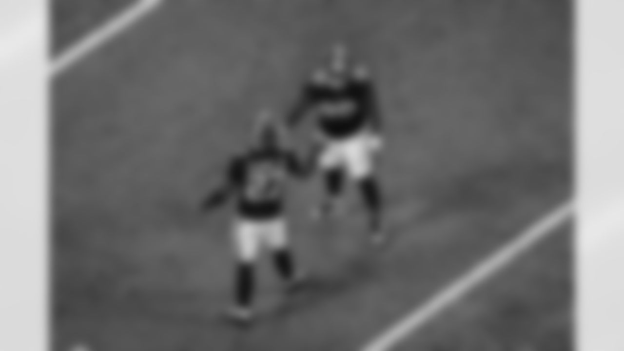 Atlanta Falcons defensive lineman Ruke Orhorhoro #98 and Atlanta Falcons edge rusher James Pearce Jr. #27 react during the Week 17 Game against the Los Angeles Rams at Mercedes-Benz Stadium in Atlanta, Georgia on Monday, December 29, 2025. (Photo by Jay Bendlin/Atlanta Falcons)