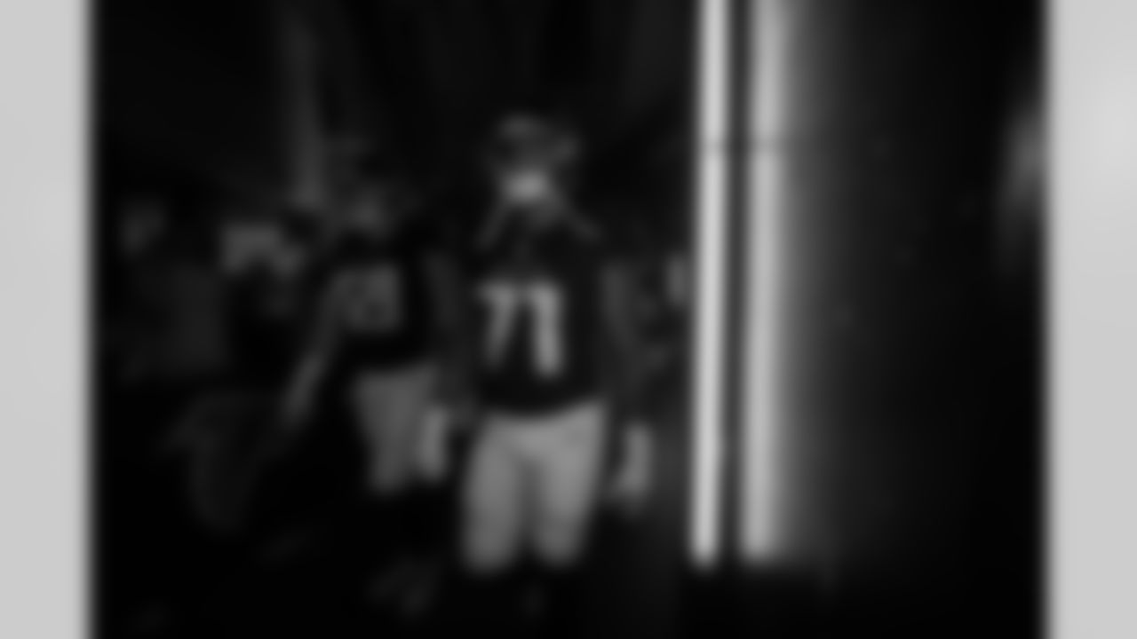 Atlanta Falcons offensive lineman Elijah Wilkinson #71 and Atlanta Falcons offensive lineman Jack Nelson #69 walk out from the locker room before the Preseason Game against the Tennessee Titans at Mercedes-Benz Stadium in Atlanta, Georgia on Friday, August 15, 2025. (Photo by Taylor McLaughlin/Atlanta Falcons)