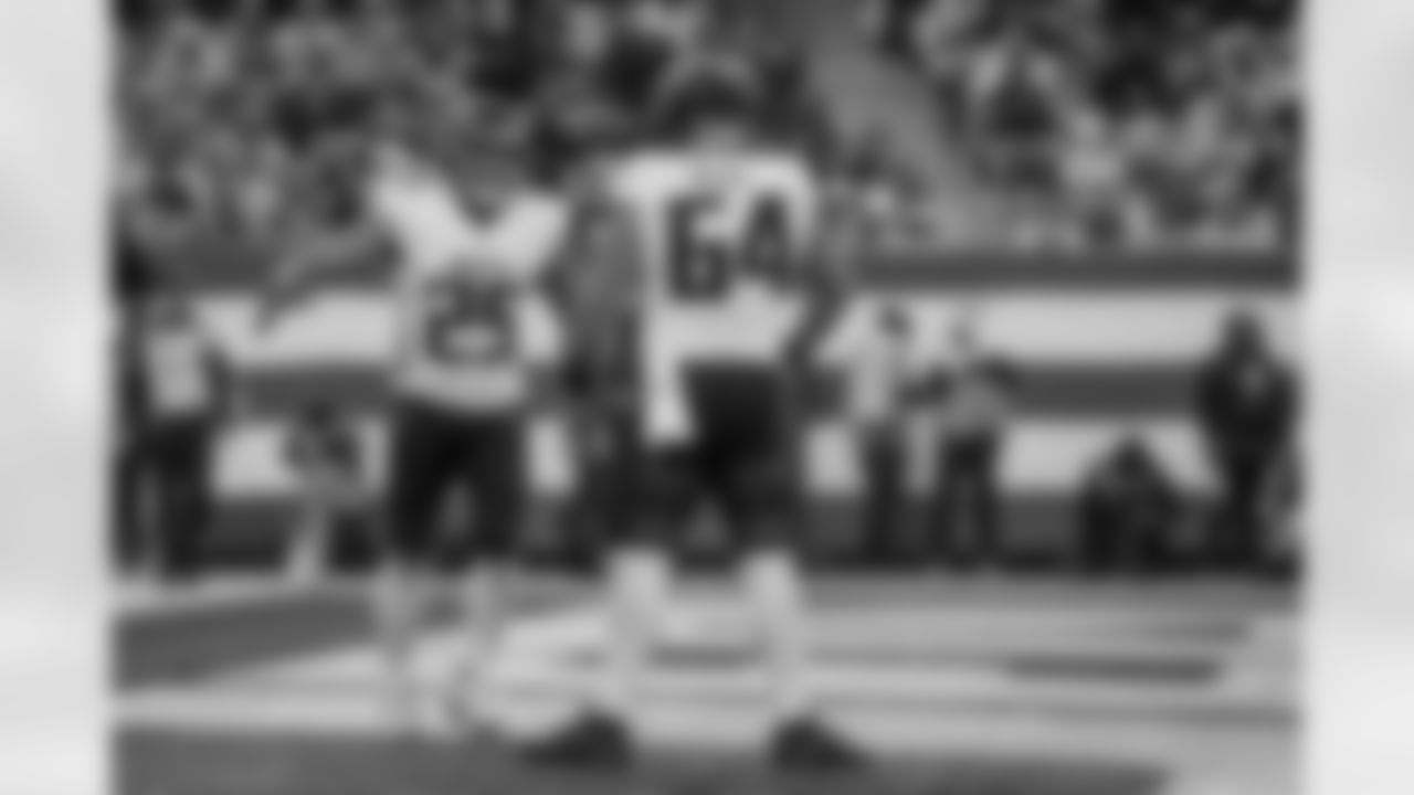 Atlanta Falcons running back Tyler Allgeier #25 celebrates a touchdown with Atlanta Falcons offensive lineman Ryan Neuzil #64 during the Week 13 Game against the New York Jets at Metlife Stadium in East Rutherford, New Jersey on Sunday, November 30, 2025. (Photo by Jay Bendlin/Atlanta Falcons)