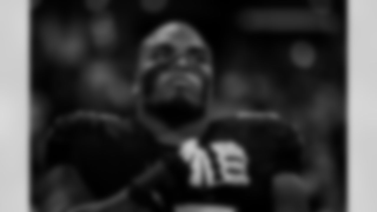 Atlanta Falcons offensive lineman Kyle Hinton #68 during the National Anthem before the Week 14 Game against the Seattle Seahawks at Mercedes-Benz Stadium in Atlanta, Georgia on Sunday, December 7, 2025. (Photo by Taylor McLaughlin/Atlanta Falcons)