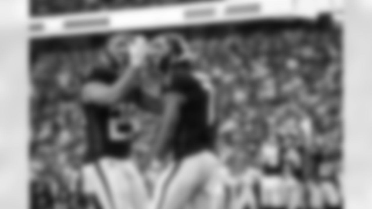 Atlanta Falcons running back Tyler Allgeier #25 celebrates after Atlanta Falcons running back Bijan Robinson #7 scores a touchdown during the Week 16 Game against the Arizona Cardinals at State Farm Stadium in Glendale, Arizona on Sunday, December 21, 2025. (Photo by Taylor McLaughlin/Atlanta Falcons)