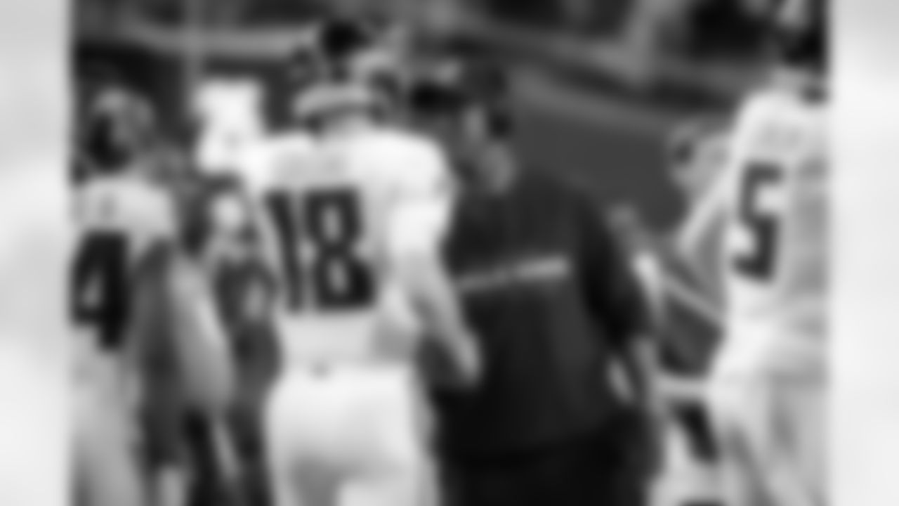 Atlanta Falcons quarterback Kirk Cousins #18 and head coach Raheem Morris react after a touchdown during the first quarter of the Week 15 Game against the Las Vegas Raiders at Allegiant Stadium in Las Vegas, Nevada on Monday, December 16, 2024. (Photo by Shanna Lockwood/Atlanta Falcons)