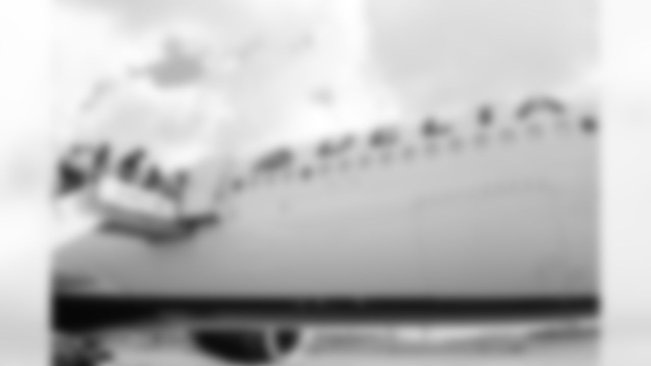 Atlanta Falcons players board the plane at Hartsfield-Jackson International Airport in Atlanta, Ga. on Saturday, October 18, 2025. (Photo by Jay Bendlin/Atlanta Falcons)