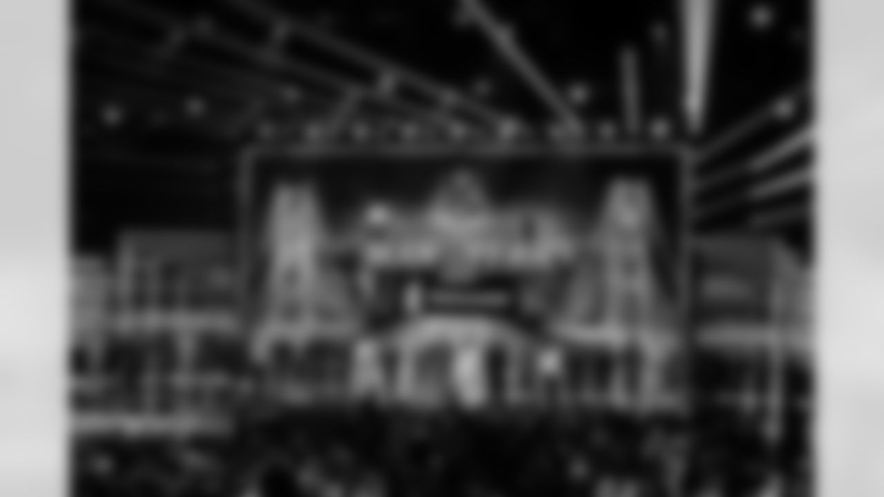 Atlanta Falcons cornerback A.J. Terrell Jr. #24 and the Walter Payton NFL Man of the Year nominees stand on the stage during the NFL Honors award show, Thursday, Feb. 5, 2026, in San Francisco. (AP Photo/Charlie Riedel)