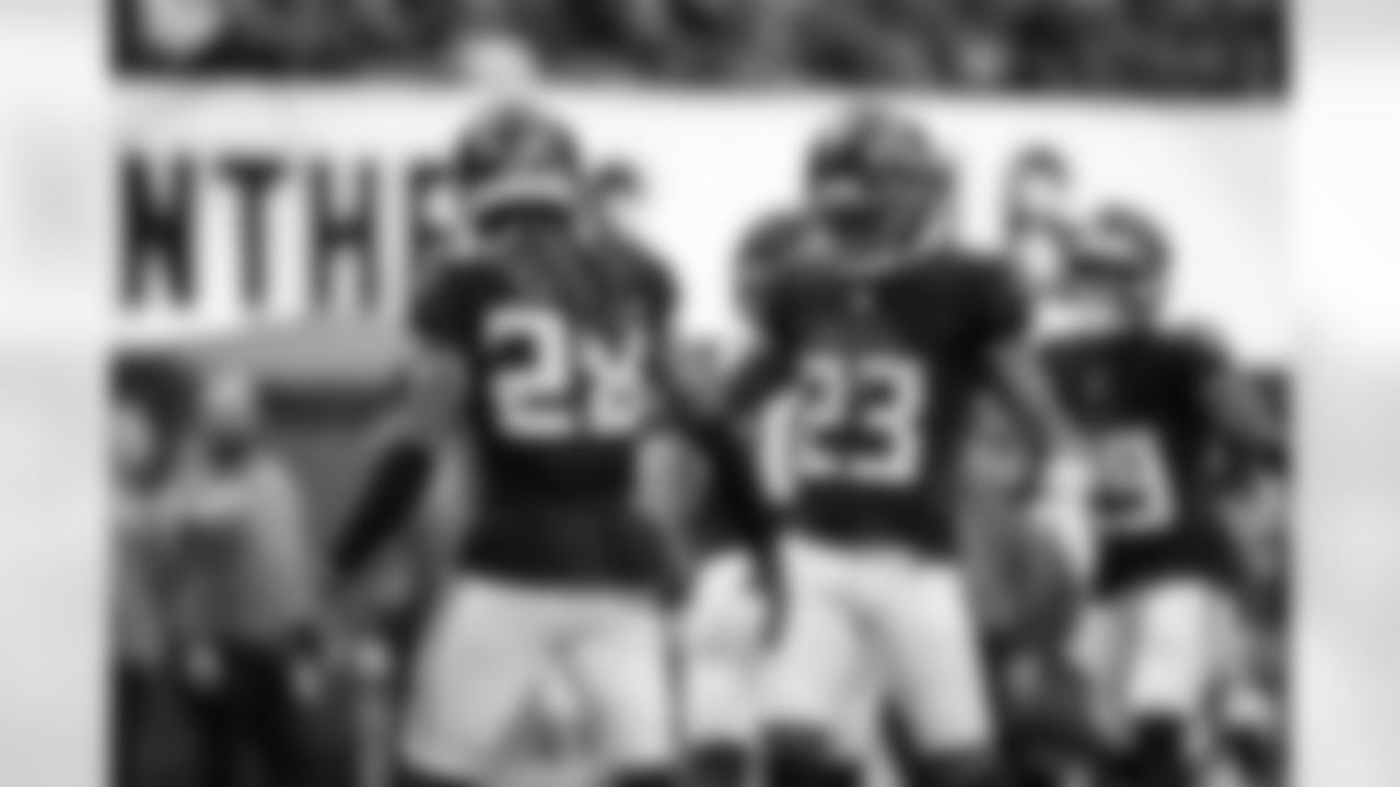 Atlanta Falcons cornerback Mike Ford Jr. #28 and Atlanta Falcons defensive back DeMarcco Hellams #23 react during the Week 11 Game against the Carolina Panthers at Mercedes-Benz Stadium in Atlanta, Georgia on Sunday, November 16, 2025. (Photo by Jay Bendlin/Atlanta Falcons)