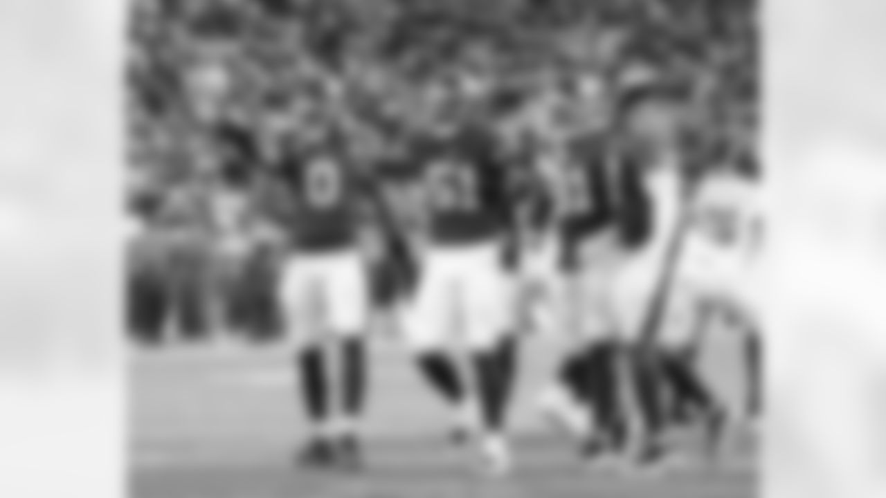 New York Giants linebacker Brian Burns (0),New York Giants linebacker Abdul Carter (51), New York Giants defensive tackle Darius Alexander (91),New York Giants defensive end Chauncey Golston (57)