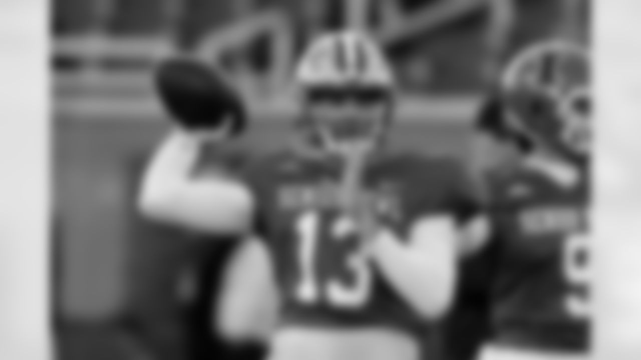 American Team quarterback Garrett Nussmeier (13), of LSU, throws a pass during practice for the Senior Bowl NCAA college football game, Wednesday, Jan. 28, 2026, in Mobile, Ala. (AP Photo/Butch Dill)