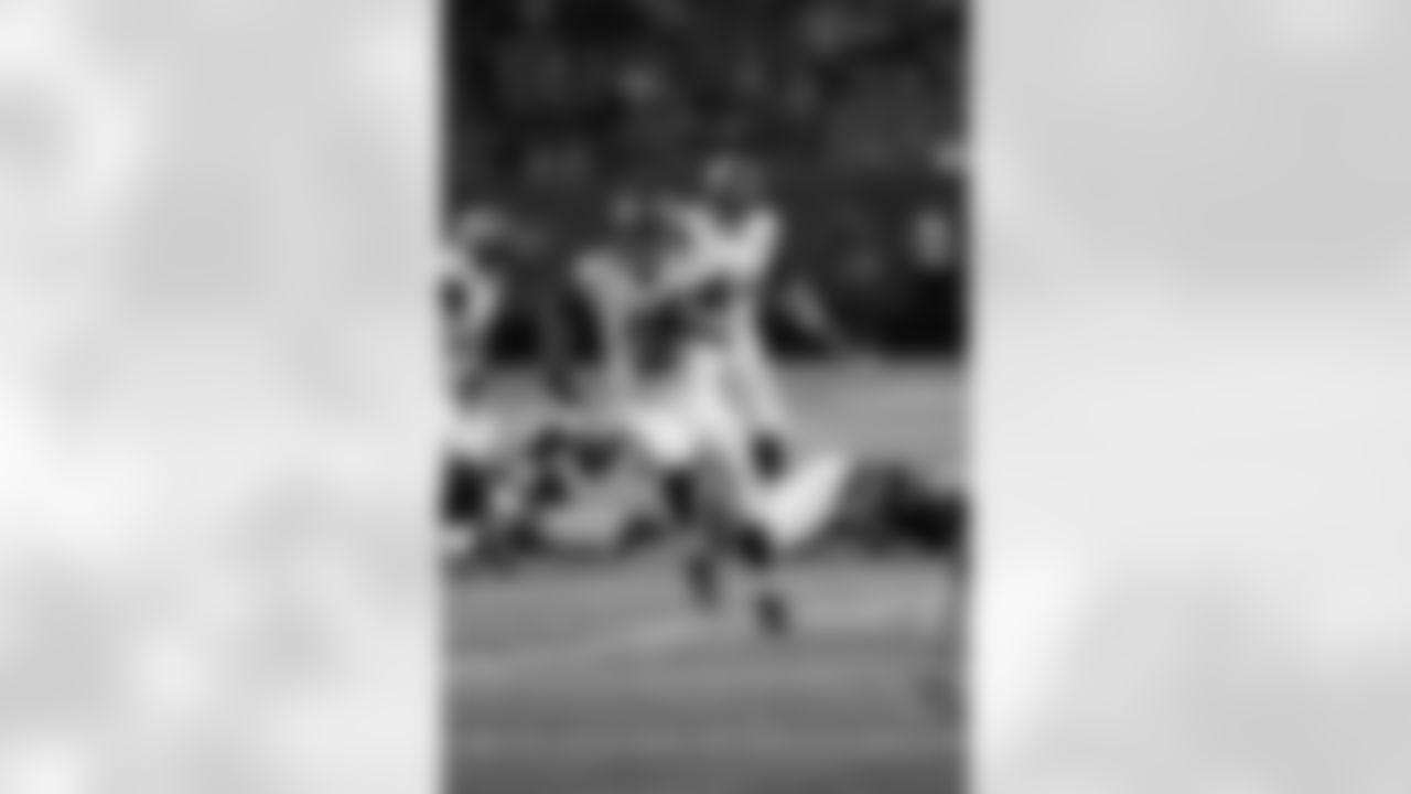 Jacksonville Jaguars quarterback Mike Kafka (3) runs against the Atlanta Falcons during the second half of a preseason NFL football game, Thursday, Aug. 29, 2013, in Atlanta. (AP Photo/Dave Martin)