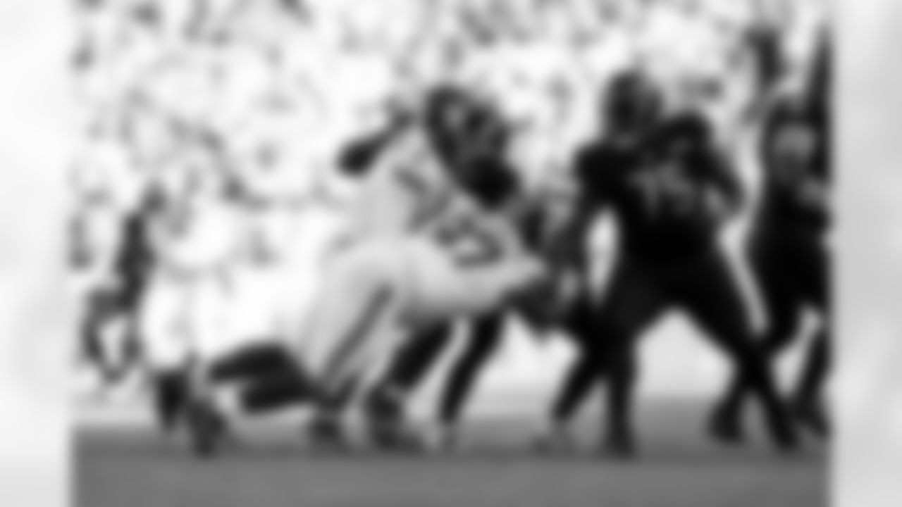 OLB Kayvon Thibodeaux (5), NT Dexter Lawrence II (97)