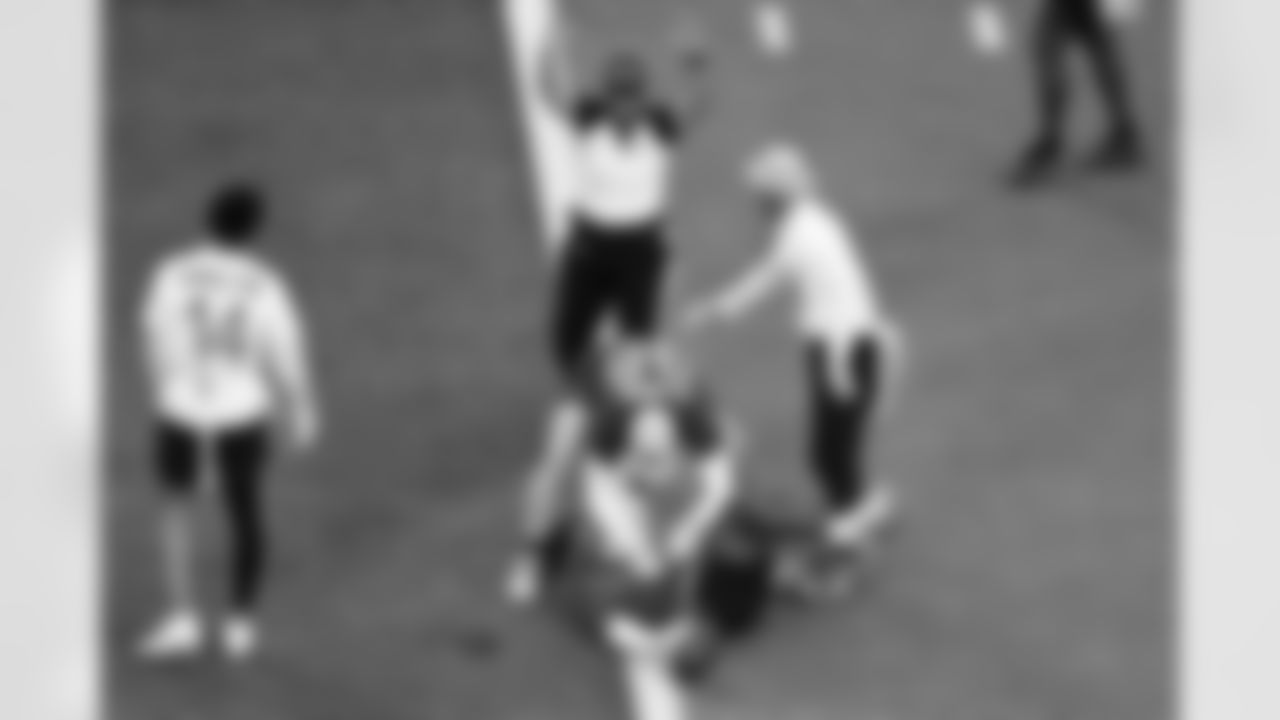 NFC receiver Malik Nabers, below, of the New York Giants, is congratulated by tight end Trey McBride (85), of the Arizona Cardinals, after scoring a touchdown against the AFC during the NFL Pro Bowl Games, Sunday, Feb. 2, 2025, in Orlando, Fla. (Phelan M. Ebenhack/AP Images for NFL)