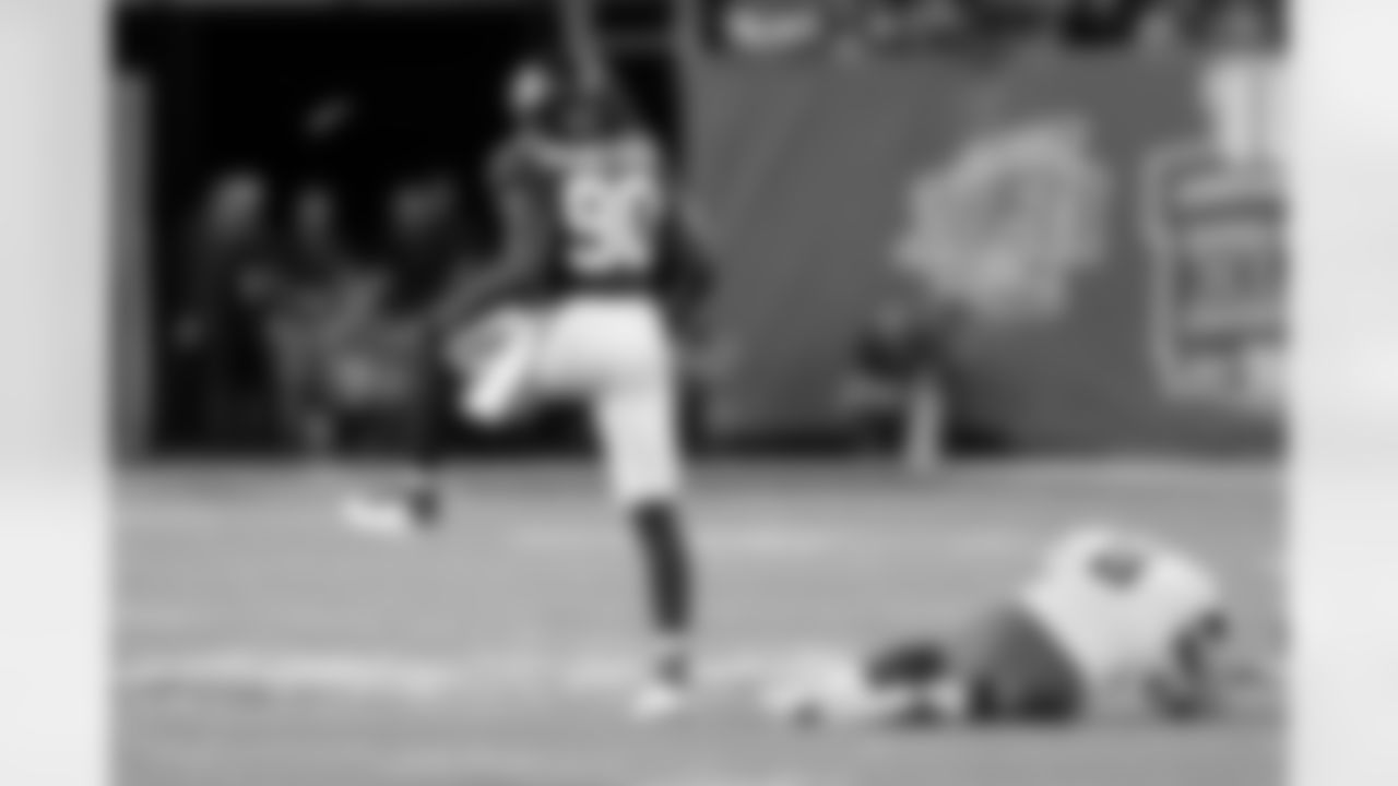 New York Giants defensive end Jason Pierre-Paul (90) high steps as he celebrates after a second quarter strip sack on Detroit Lions quarterback Matthew Stafford (9) during the 2017 NFL week 2 regular season football game against the against the Detroit Lions, Monday, Sept. 18, 2017 in East Rutherford, N.J. The Lions won the game 24-10. (Paul Spinelli via AP)