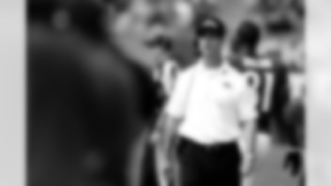 Baltimore Ravens head coach John Harbaugh walks the sidelines in the second half of an NFL football game against the Philadelphia Eagles, Sunday, Sept. 16, 2012, in Philadelphia. (AP Photo/Mel Evans)