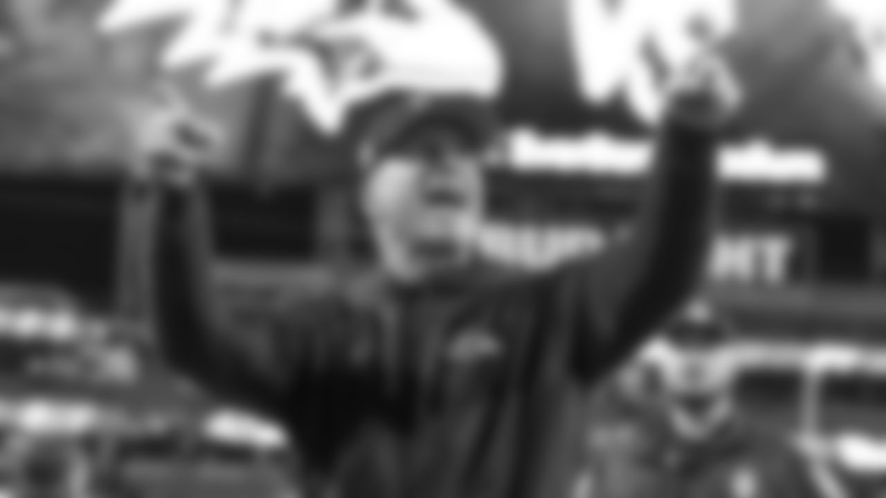 Baltimore Ravens head coach John Harbaugh reacts to fans as he walks off the field after an NFL football game against the Jacksonville Jaguars, Sunday, Dec. 17, 2023, in Jacksonville, Fla. The Ravens defeated the Jaguars 23-7. (AP Photo/Gary McCullough)