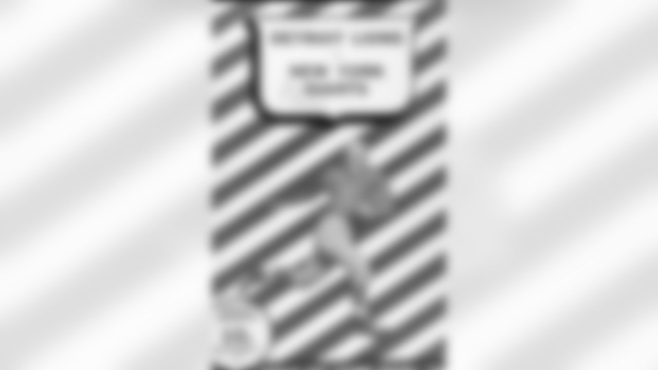 This photo shows the official program from the Detroit Lions NFL game against New York Giants played on Nov. 7, 1943, in Detroit. (Hall of Fame via AP)