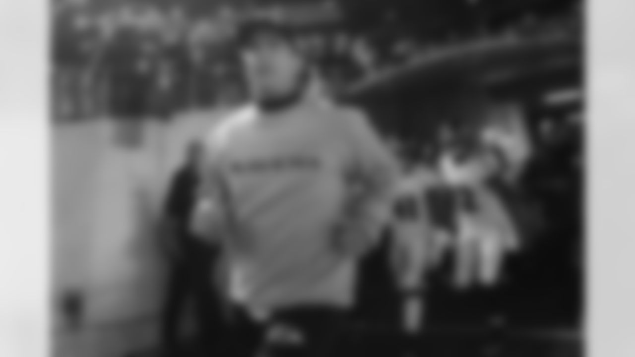 Baltimore Ravens head coach John Harbaugh leads the team to the field for the start of an NFL football game against the Pittsburgh Steelers, Sunday, Nov. 2, 2014, in Pittsburgh. (AP Photo/Don Wright)