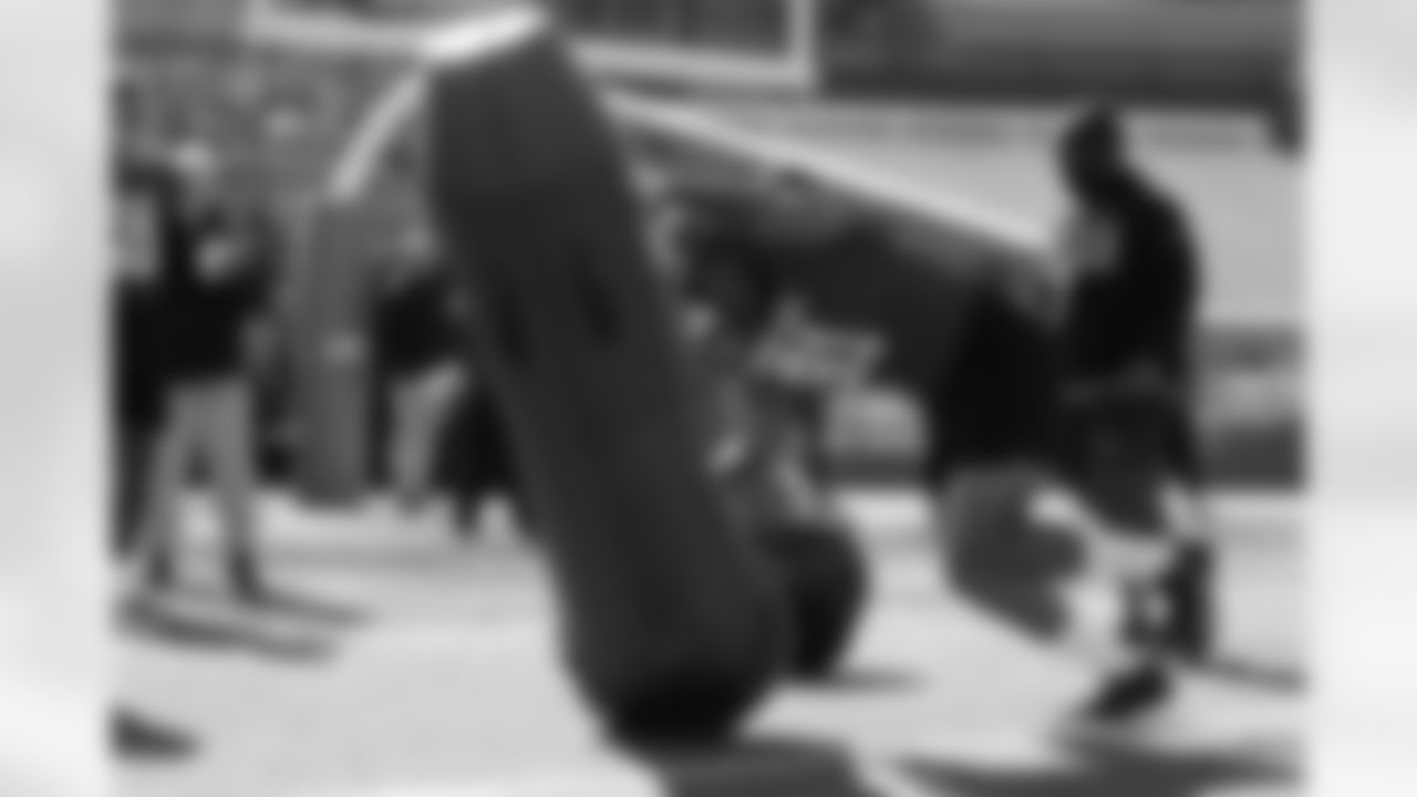 National Team defensive tackle Deven Eastern (91), of Minnesota, runs through drills during practice for the Senior Bowl NCAA college football game Tuesday, Jan. 27, 2026, in Mobile, Ala. (AP Photo/Butch Dill)