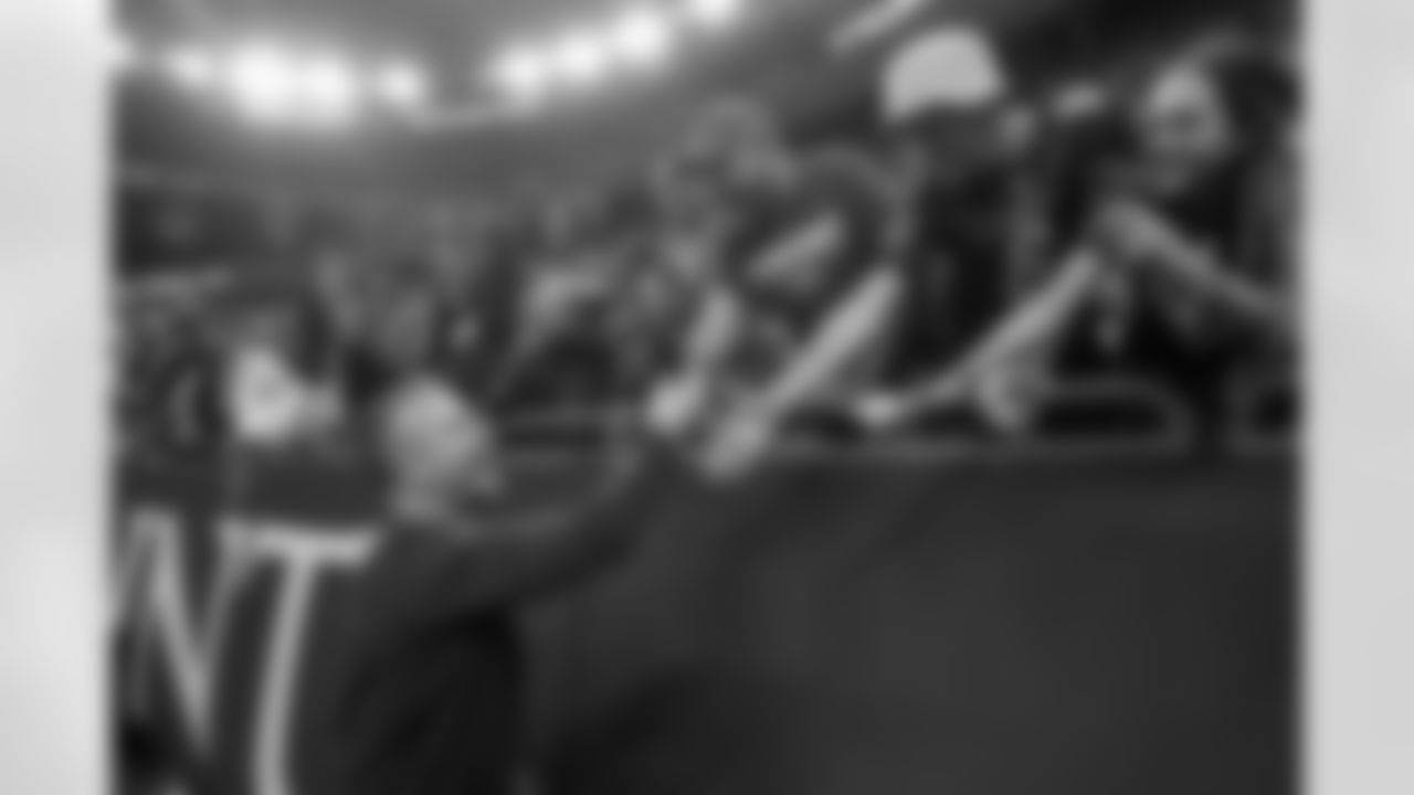 Baltimore Ravens head coach John Harbaugh greets fans after an NFL football game against the New Orleans Saints in New Orleans, Monday, Nov. 7, 2022. The Ravens won 27-13. (AP Photo/Butch Dill)