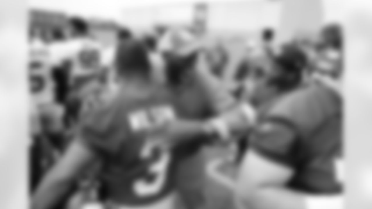 Otis Anderson . QB Russell Wilson (3)