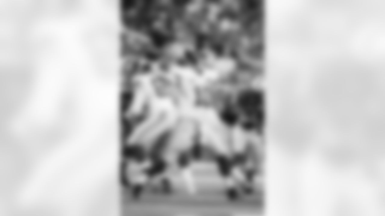 New York Giants quarterback Eli Manning (10) passes the ball against the Detroit Lions during an NFL football game at Ford Field in Detroit, Monday, Sept. 8, 2014. (AP Photo/Rick Osentoski)