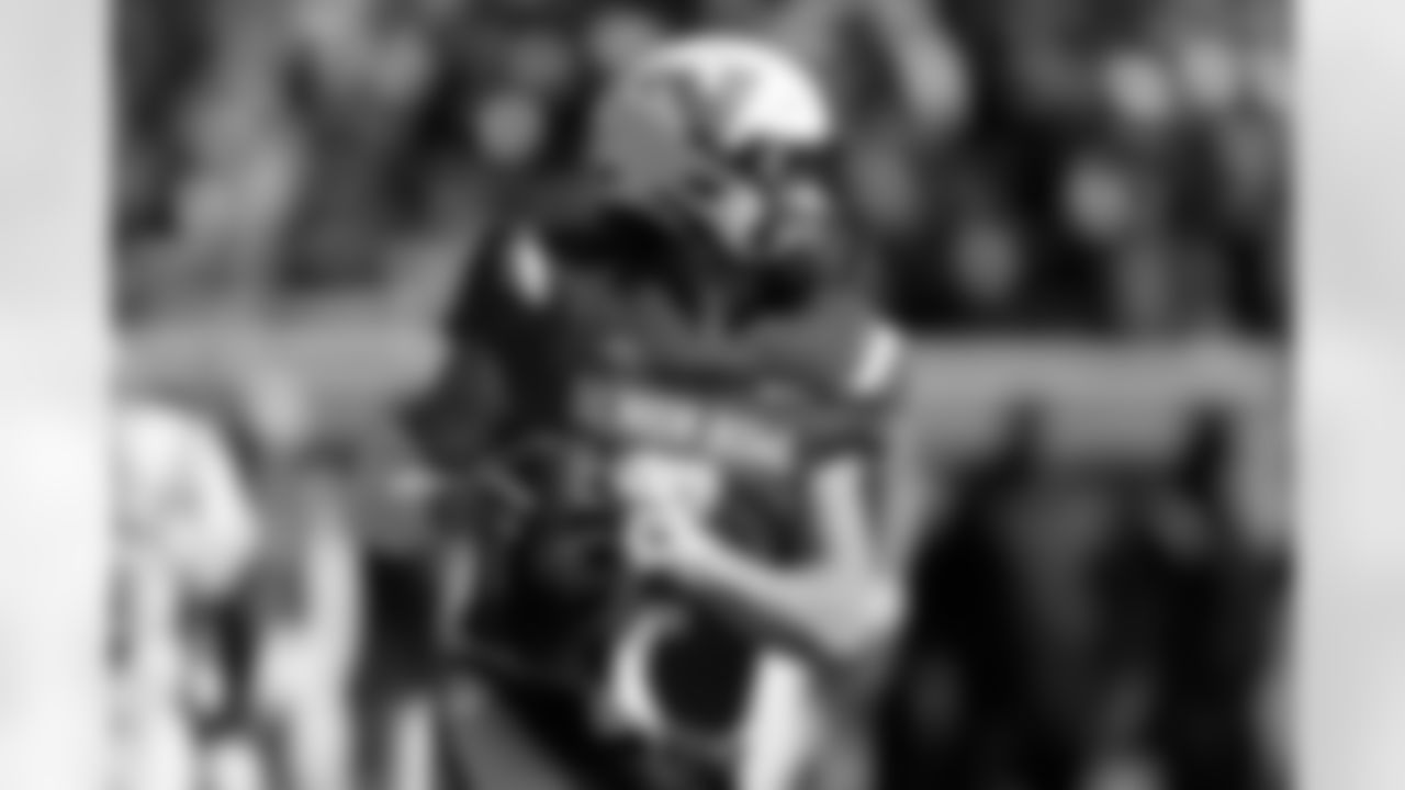 National Team quarterback Diego Pavia (2), of Vanderbilt, rolls out to pass during the first half of the Senior Bowl NCAA college football game Saturday, Jan. 31, 2026, in Mobile, Ala. (AP Photo/Butch Dill)