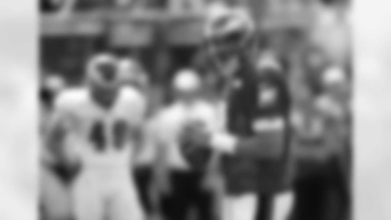 Philadelphia Eagles quarterback, Mike Kafka (3) gets ready to pass to pass during the teams NFL football training camp at Lehigh University in Bethlehem, Pa, Monday, July 30, 2012. (AP Photo/Rich Schultz)