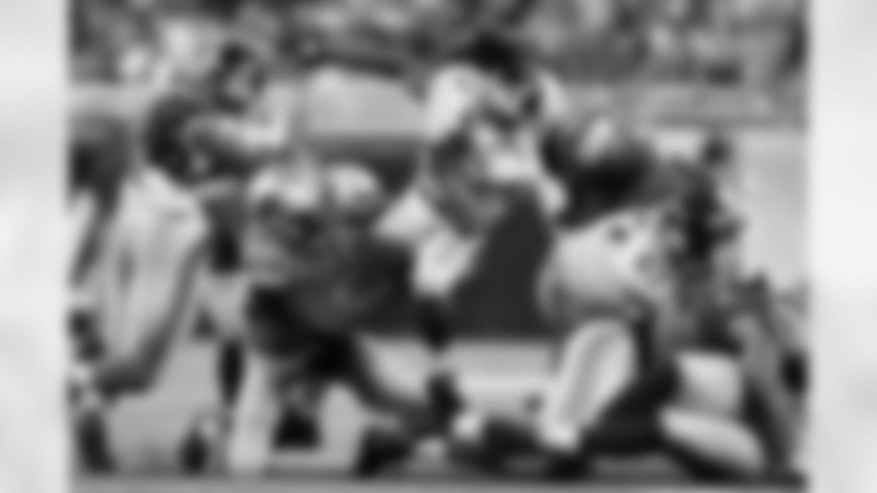 New York Giants running back Rashad Jennings (23) is tackled by Detroit Lions free safety Isa Abdul-Quddus (42) during an NFL football game at Ford Field in Detroit, Monday, Sept. 8, 2014. (AP Photo/Rick Osentoski)