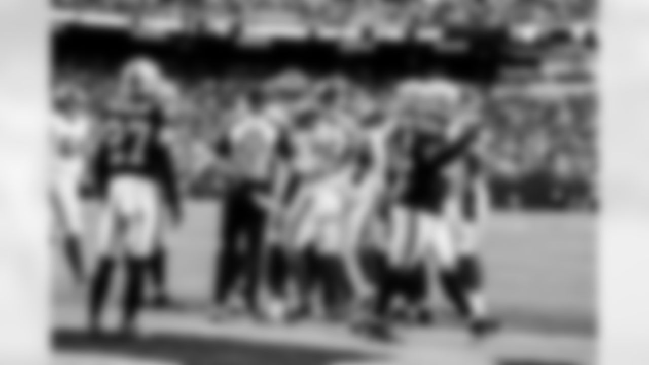 RB Devin Singletary (26), TE Chris Manhertz (85)