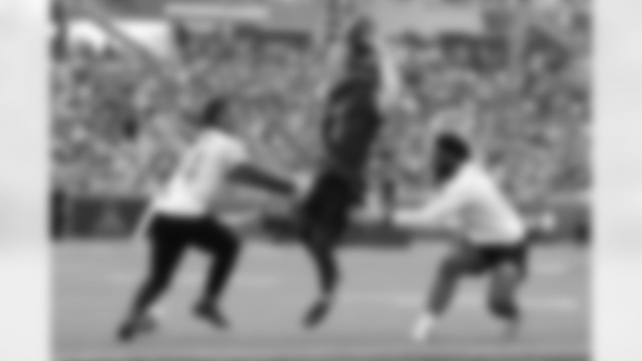 NFC wide receiver Malik Nabers (1) of the New York Giants runs up field during the NFL Pro Bowl football game, Sunday, Feb. 2, 2025, in Orlando, Fla. (Perry Knotts via AP)