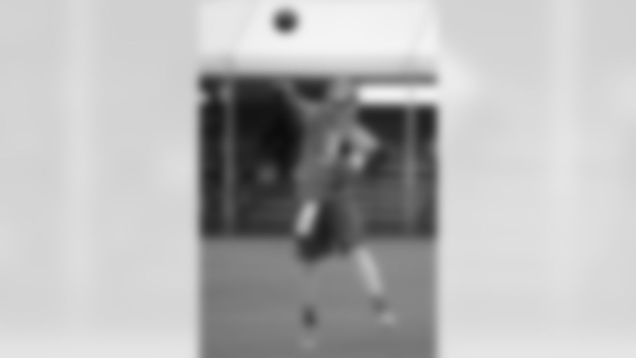 Tampa Bay Buccaneers quarterback Mike Kafka (3) throws a pass during NFL football training camp in Tampa, Fla., Friday, July 25, 2014.(AP Photo/Phelan M. Ebenhack)