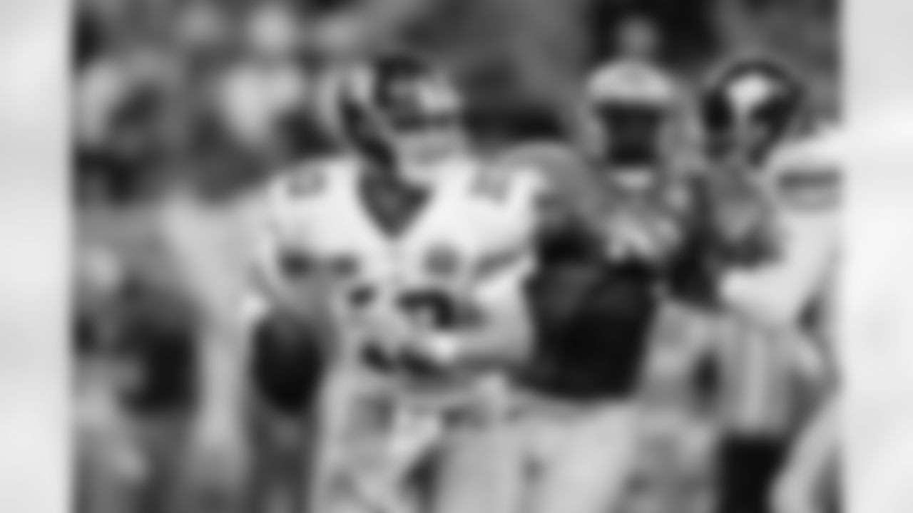 New York Giants quarterback Eli Manning (10) scrambles against the Detroit Lions during an NFL football game at Ford Field in Detroit, Monday, Sept. 8, 2014. (AP Photo/Rick Osentoski)