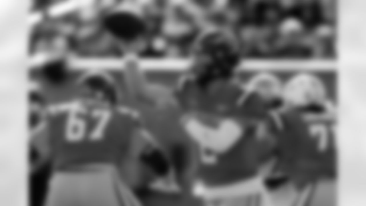 American team quarterback Jaxson Dart, center, of Mississippi, throws a pass during the first half of the Senior Bowl NCAA college football game against the National team Saturday, Feb. 1, 2025, in Mobile, Ala. (AP Photo/Butch Dill)