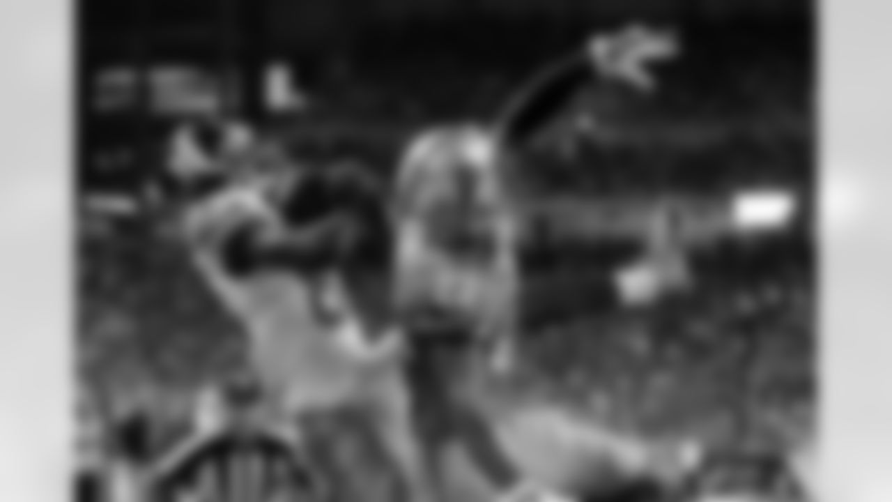 Detroit Lions cornerback Darius Slay (23) tries to break up a pass intended for New York Giants wide receiver Corey Washington (88) during a NFL football game in Detroit, Friday, Sept. 12, 2014. The pass was incomplete. (AP Photo/Paul Sancya)