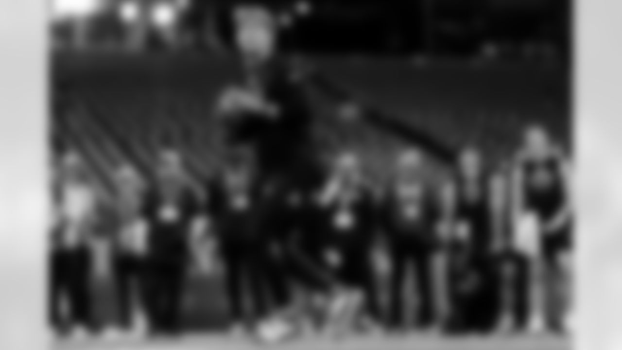 Mississippi quarterback Jaxson Dart participates in a drill at the NFL football scouting combine in Indianapolis, Saturday, March 1, 2025. (Brooke Sutton via AP)