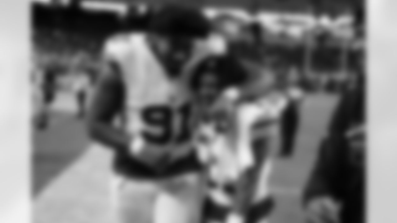 New York Giants defensive tackle Darius Alexander (91), New York Giants wide receiver Wan'Dale Robinson (17)