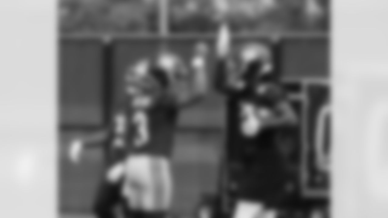 QB Russell Wilson (3),WR Zach Pascal (83)