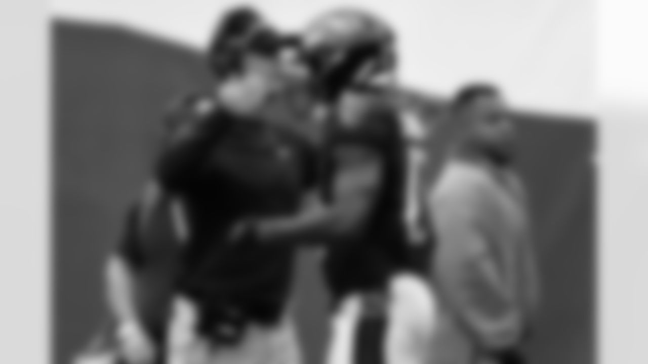 Baltimore Ravens head coach John Harbaugh congratulates wide receiver Devin Duvernay (13) who scored a touchdown during the third quarter of an NFL football game against the New York Jets, Sunday, Sep.11, 2022, in East Rutherford, N.J.. (AP Photo/Rich Schultz)